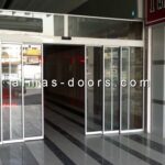 درب اتوماتیک شیشه ای خم